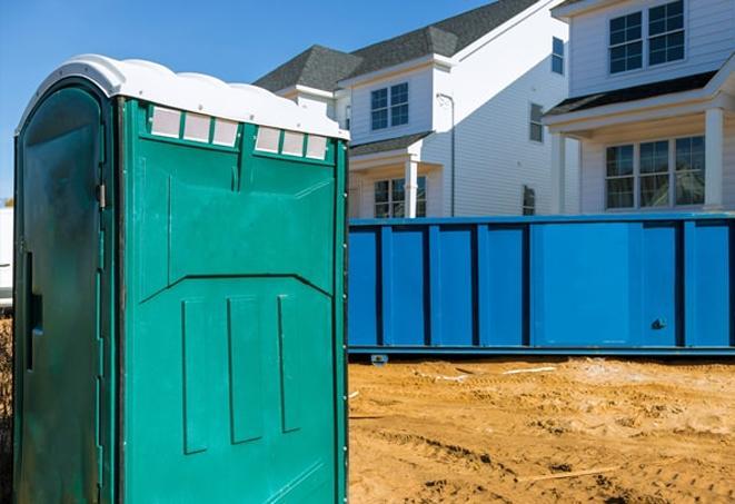 a sea of porta potties at a construction site